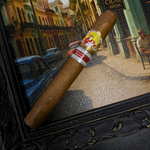 Cigar with a band on a decorative stand featuring a cityscape background